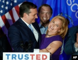 Republican presidential candidate Sen. Ted Cruz, R-Texas, hugs his wife Heidi, during a primary night campaign event, in Milwaukee, April 5, 2016.