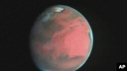Barcha sayyoralardan insoniyatni aynan Mars qiziqtirib keladi. Xabble teleskopi yordamida olingan surat.