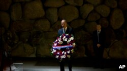 Britain's Prince William pays respects during a ceremony at the Hall of Remembrance at the Yad Vashem Holocaust memorial in Jerusalem, Israel, Tuesday, June 26, 2018. 