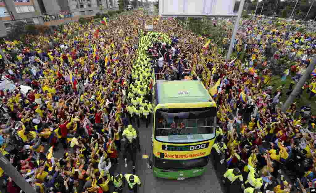 Members of Colombia&rsquo;s national soccer team are welcomed home from the World Cup, in Bogota, Colombia.