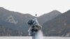 این عکس را کره شمالی از پرتاب آزمایشی موشک بالیستیک از زیردریایی منتشر کرده است