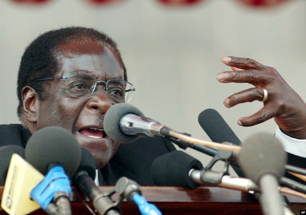 Zimbabwean President Robert Mugabe speaks at a state funeral in Harare, Zimbabwe, in this Aug, 28, 2005 file photo. (AP Photo)
