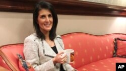 Gov. Nikki Haley speaks to a reporter, Jan. 9, 2017. Haley says dealing with lawmakers and serving as the state's healer-in-chief through deadly natural disasters, a shooting massacre and other crises has equipped her for the role of UN ambassador.