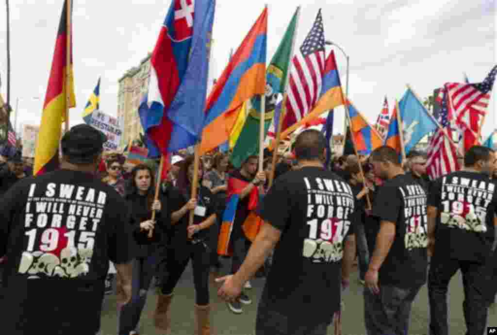 Thousands of demonstrators march to mark the death of 1.5 million Armenians in the former Ottoman empire, in Los Angeles, Tuesday, April 24, 2012. The demonstration is an annual remembrance of the 1915 killings of Armenians in the Turkish territories duri