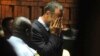 Pistorius llora al ser acusado de asesinato