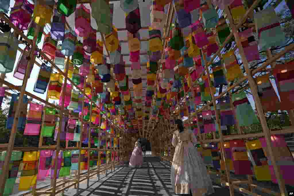 Visitors walk through the lanterns at the Royal Culture Festival at the Gyeongbok Palace, one of South Korea&#39;s well-known landmarks, in Seoul.