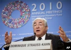 International Monetary Fund's Managing Director Dominique Strauss-Kahn warns against a race to devalue currencies