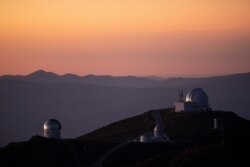 A general view during the sunset in 'Las Campanas' Observatory, located in the Andes Mountains, in the Atacama Desert area, near Vallenar, Chile, October 14, 2021. Picture taken October 14, 2021. REUTERS/Pablo Sanhueza