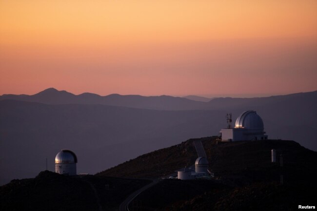 A general view during the sunset in 'Las Campanas' Observatory, located in the Andes Mountains, in the Atacama Desert area, near Vallenar, Chile, October 14, 2021. Picture taken October 14, 2021. REUTERS/Pablo Sanhueza