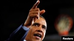 U.S. President Barack Obama speaks about the economy during a visit to Knox College in Galesburg, Illinois July 24, 2013.