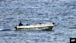 Indian Ocean - An armed suspected pirate in international waters off the coast of Somalia. (File)