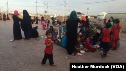 At a camp about 50 kilometers from the nearest fighting, families say they've fled Islamic State militants sometimes several times. They say new arrivals have a long wait for shelter in Iraqi Kurdistan, Oct. 20, 2016.