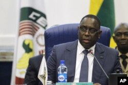 FILE - Senegal's President Macky Sall addresses the opening of the 48th ordinary session of ECOWAS Authority of Head of States and Government in Abuja, Nigeria December 16, 2015.