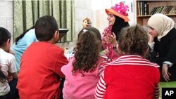 Rana Dajani began her library program by reading to children in a neighborhoodl mosque in her native Jordan.