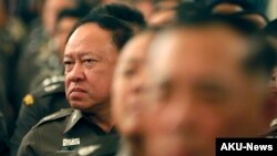 FILE - Thai policemen listen to a speech at Government House in Bangkok, Thailand, April 3, 2015. 