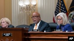 Chairman Bennie Thompson, D-Miss., flanked by Rep. Zoe Lofgren, D-Calif., left, and Vice Chair Liz Cheney, R-Wyo., speaks as the House select committee tasked with investigating the January 6th attack on the Capitol meets in Washington, Oct. 19, 2021. 