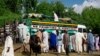 A busy day at Maiduguri's cattle market, and a truck with an apt description. (Fati Abubakar)