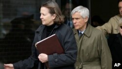 Defense attorneys Judy Clarke, left, and David Bruck leave federal court in Boston where their client Dzhokhar Tsarnaev was convicted on multiple charges in the 2013 Boston Marathon bombing, April 8, 2015.