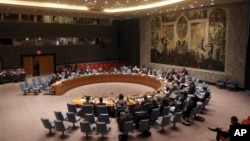 A panel of journalists and diplomats addresses a United Nations Security Council meeting on the protection of civilians in armed conflict and the protection of journalists, at U.N. headquarters in New York, July 17, 2013.