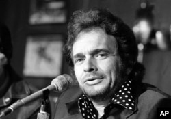FILE - Country singer Merle Haggard is shown at a news conference in New York City, April 6, 1974.
