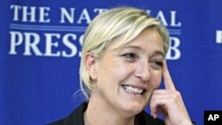 French presidential candidate Marine Le Pen speaks during a news conference at The National Press Club in Washington, Nov. 2, 2011.