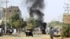 A tire is seen burning during anti-government protests in Khartoum, Sudan, Jan. 24, 2019. 