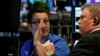 Traders work on the floor of the New York Stock Exchange in New York, Oct. 14, 2016. 