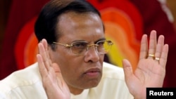 FILE - Sri Lanka's President Maithripala Sirisena speaks during a meeting with Foreign Correspondents Association at his residence in Colombo, Sri Lanka, Nov. 25, 2018.