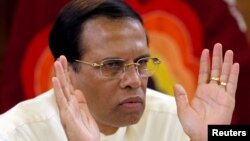 FILE - Sri Lanka's President Maithripala Sirisena speaks during a meeting with Foreign Correspondents Association at his residence in Colombo, Sri Lanka, Nov. 25, 2018.