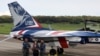 Presiden Taiwan Tsai Ing-Wen menerima model AIDC T-5 Brave Eagle, jet latih canggih pertama buatan Taiwan, dari para pilot di Taichung, Taiwan, 22 Juni 2020. (Foto: REUTERS/Ann Wang)