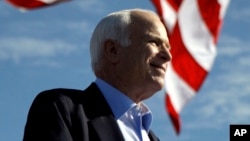 FILE - Republican presidential candidate Sen. John McCain, R-Ariz. speaks at a rally outside Raymond James Stadium in Tampa, Florida, Nov. 3, 2008.