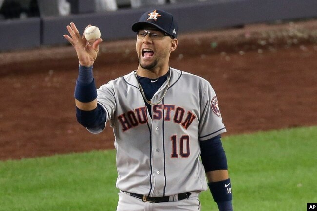 FILE - Houston Astros first baseman Yuli Gurriel (10) reacts after making the play in the American League Championship Series against the New York Yankees on Oct. 15, 2019, in New York. (AP Photo/Seth Wenig)