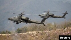 미 육군 AH-64 아파치 공격헬기 부대가 한국 포천 사격장에서 열린 미한 실사격훈련에 참가했다. (자료사진)