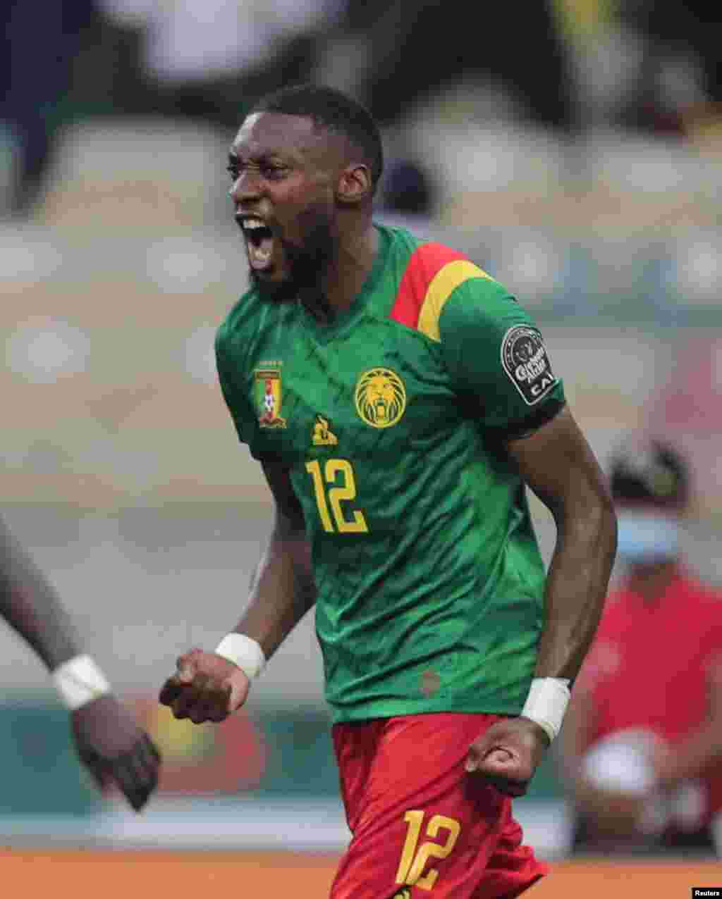 Cameroon&#39;s Karl Toko-Ekambi celebrates scoring their first goal against Gambia in Cameroon, Jan 29, 2022.