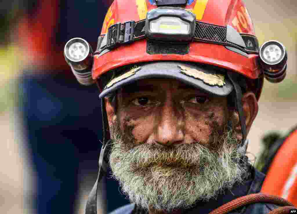 Commander General of the Moles Carlos Morales Cienfuegos, is seen during a break in the rescue works in Mexico City, Sept. 23, 2017, four days after the powerful quake that hit central Mexico.