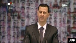 Tổng thống Syria Bashar al-Assad đọc diễn văn toàn quốc ngày 6/1/2013.