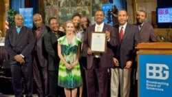 BBG Governor Dana Perino (center) with VOA Creole Service Staffers (from left) Jean-Robert Phillipe, Jacques Jean-Baptiste, Lyonel Besmarattes, Coralie Saint-Louis, Jacquelin Belizaire, Service Chief Ronald Cesar, Jean-Pierre Leroy and Cherubin Dorcil.