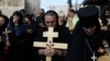 Christian pilgrims attend Good Friday procession in Jerusalem, April 14, 2017.