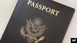 FILE - A U.S. passport cover is seen in Washington, D.C., May 25, 2021. The United States has issued its first passport with an "X-gender" designation in recognition of people who do not identify as male or female. 