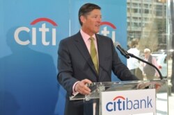 Michael Corbat, CEO, Citigroup Inc., speaks at a Citibank branch ribbon cutting on April 10, 2013 in Washington.