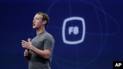 CEO Mark Zuckerberg gestures while addressing a Facebook Developer Conference in San Francisco, California, March 25, 2015. On Wednesday, he is to meet with "conservative thought leaders" amid reports Facebook excluded conservative news from its "trending topics" section.