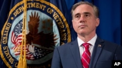 Veterans Affairs Secretary David Shulkin appears at a ceremony where President Donald Trump signs an Executive Order on "Improving Accountability and Whistleblower Protection" at the Department of Veterans Affairs, April 27, 2017, in Washington.