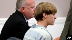 FILE - Dylann Roof appears at a court hearing in Charleston, South Carolina, July 16, 2015.