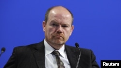 The incoming New York Times CEO, Mark Thompson, has been questioned about the BBC's handling of the scandal.