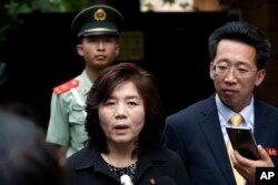 FILE - Choe Son Hui, deputy director general of the Department of US Affairs of North Korea Foreign Ministry, briefs journalists outside the North Korean embassy in Beijing, June 23, 2016.