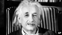 Prof. Albert Einstein is shown a few days before his 70th birthday in his home in Princeton, N.J., in March 1949.