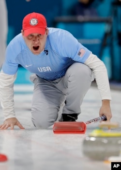 United States skip John Shuster makes a call during a men's curling match against Switzerland at the 2018 Winter Olympics in Gangneung, South Korea, Feb. 20, 2018.
