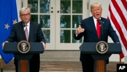 President Donald Trump and European Commission President Jean-Claude Juncker speak in the Rose Garden of the White House, July 25, 2018, in Washington.
