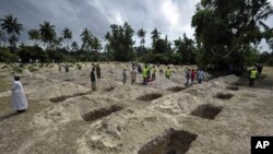 Makaburi yaliyochimbwa kuzika waliofariki katika ajali ya meli Zanzibar.