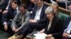 Parlamento británico ordena a May exigir que UE reabra acuerdo Brexit 